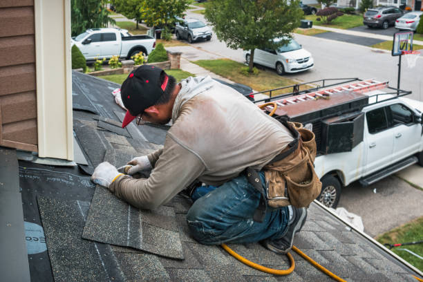 Professional Roof Replacement technician working in Marion, WI